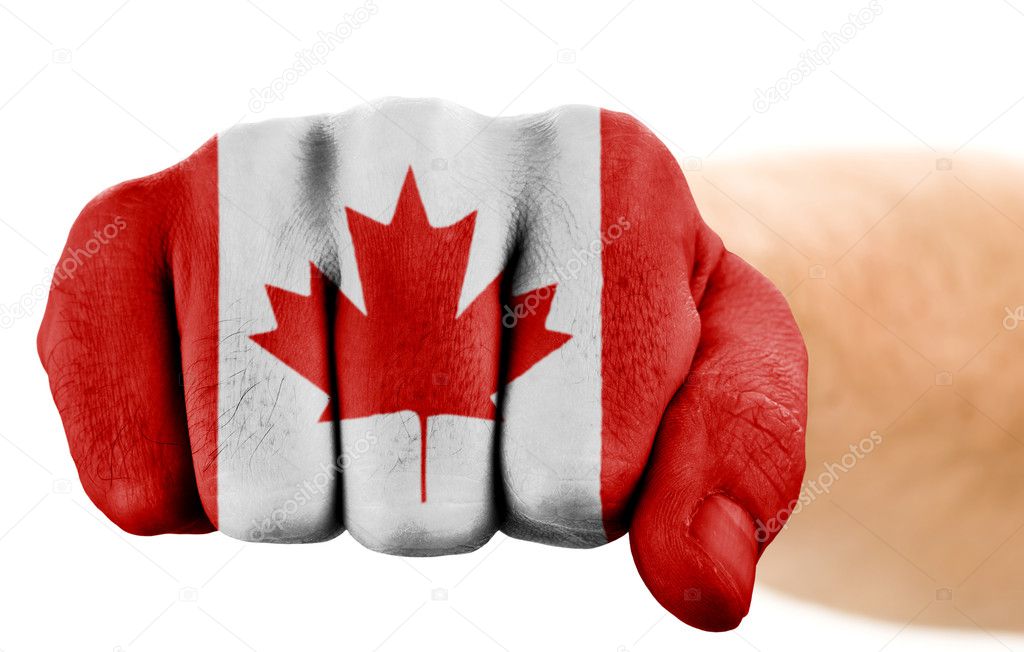Fist with canadian flag isolated on white