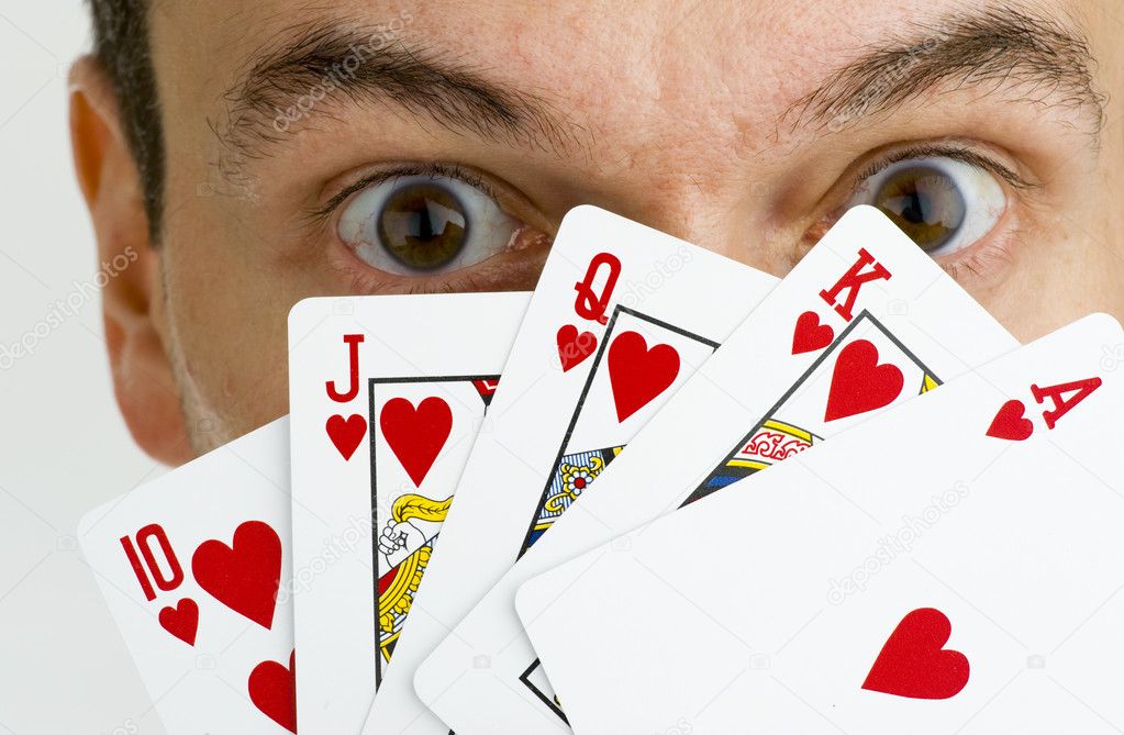 Man hiding behind cards