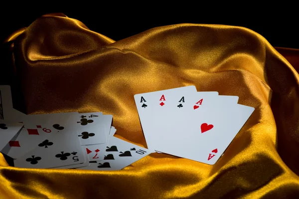4 aces on golden silk — Stock Photo, Image