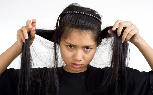 Girl holding her hair — Stock Photo, Image