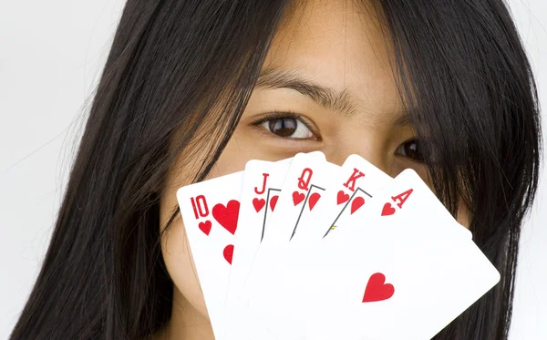 Beautiful asian woman with poker cards — Stock Photo, Image