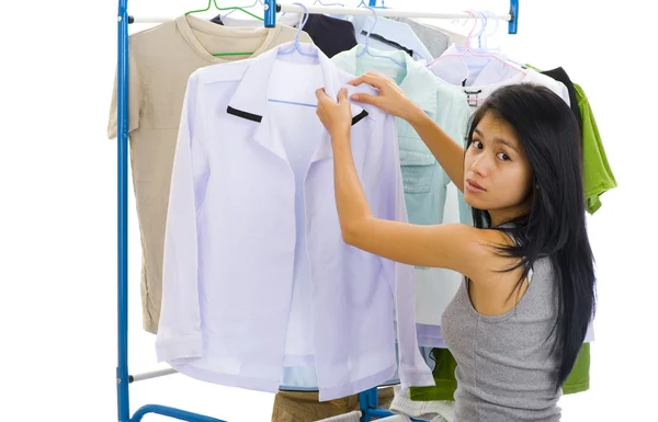 Woman hanging clothes — Stock Photo, Image