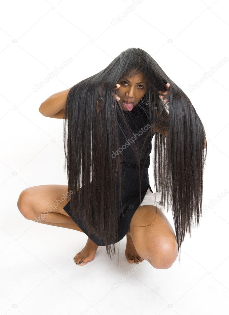 Woman covered with long hair