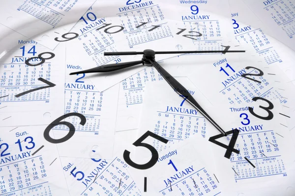 Kalendersidor och klocka — Stockfoto