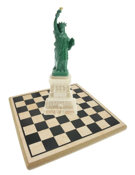 Estátua da Liberdade e Conselho de Xadrez — Fotografia de Stock