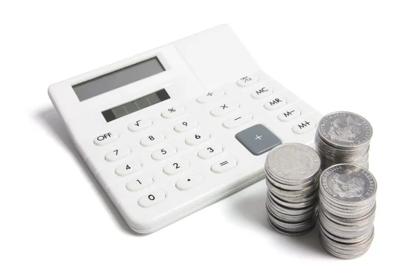 Calculadora e moedas — Fotografia de Stock