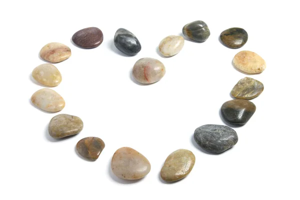 Pebbles Organizado em forma de coração — Fotografia de Stock