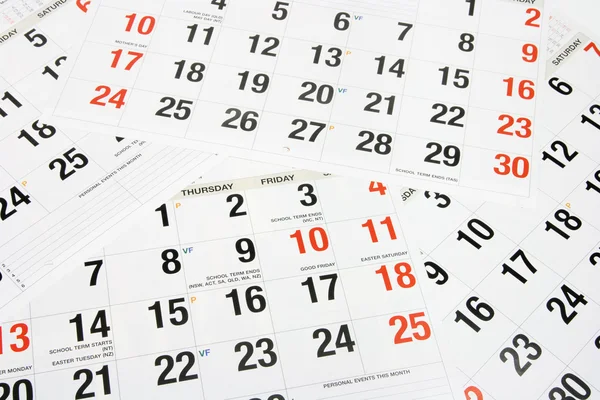 Uhr und Kalenderblätter — Stockfoto