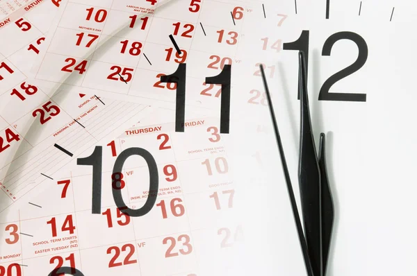 Klocka och kalender sidor — Stockfoto