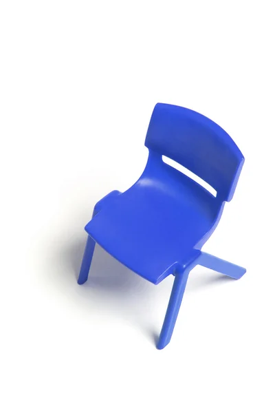 Cadeira em miniatura de plástico — Fotografia de Stock