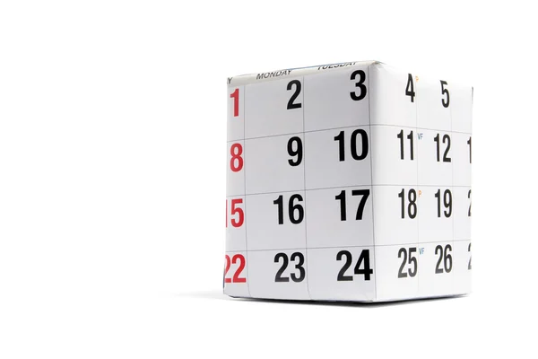 Pakket omwikkeld met pagina van kalender — Stockfoto