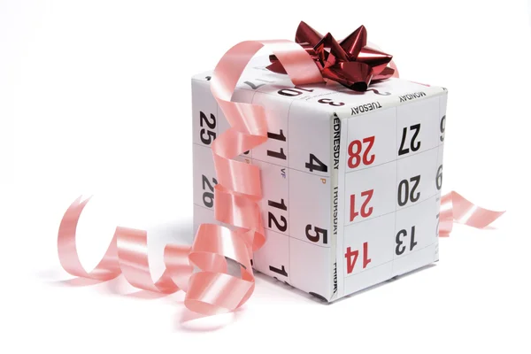 Gift Parcel Wrapped with Calendar Page — Stock Photo, Image