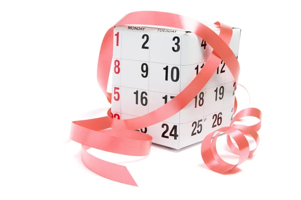 Caja de regalo envuelta con la página del calendario — Foto de Stock