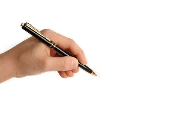 Vänsterhänt barn skriver på vitt papper — Stockfoto