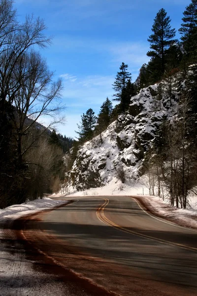 stock image Snowy mountain road