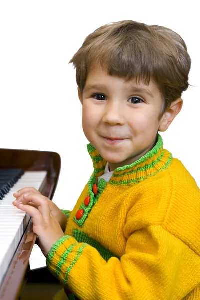 Boy and piano — Stock Photo, Image
