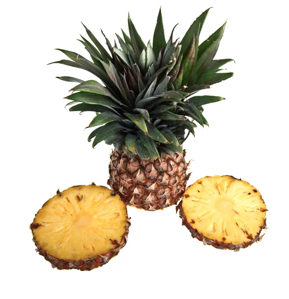 Cut pineapple against a white background — Stock Photo, Image