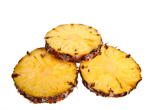 Un ananas su uno sfondo bianco Fotografia Stock