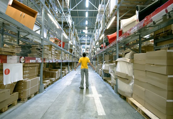 Man in storehouse — Stock Photo, Image