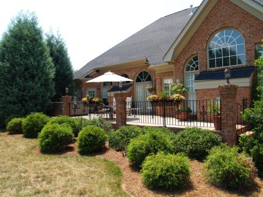 Back Terrace in Brick and Wrought Iron clipart