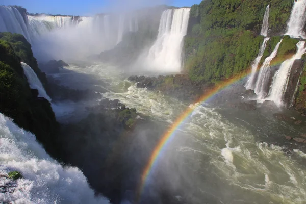 Iguazu waterfalls with rainbow — Stock Photo, Image