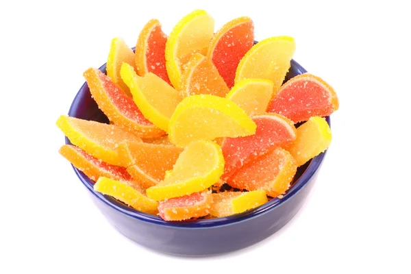 Dulces de frutas en un plato azul —  Fotos de Stock