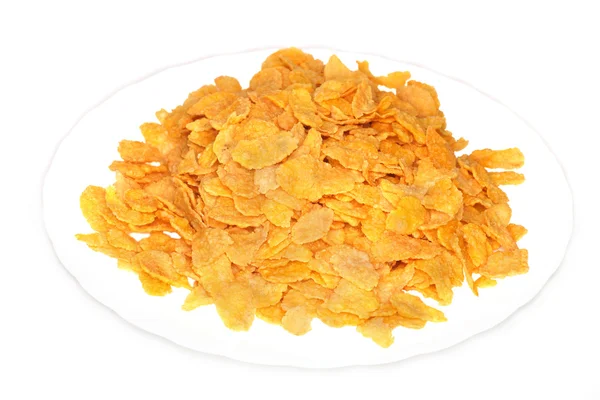 Corn flakes on a white plate — Stock Photo, Image