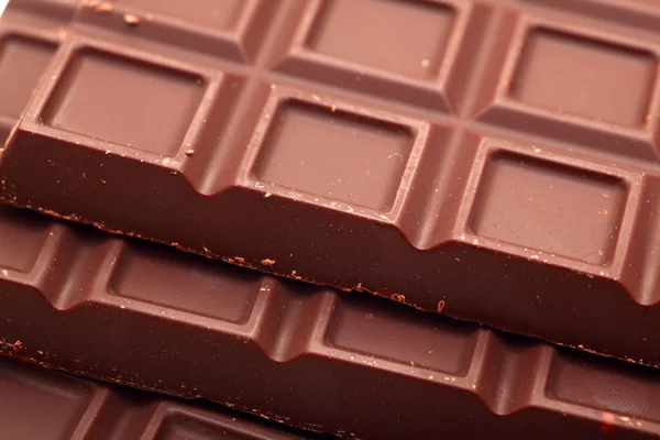 Três barras de chocolate escuro — Fotografia de Stock