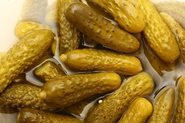 stock image Pickled gherkins in the marinade