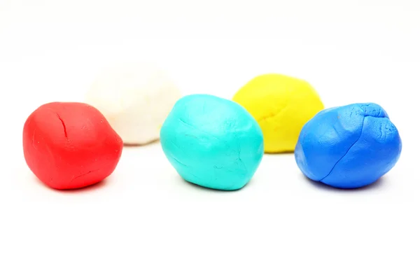 stock image Colored plasticine on white background.