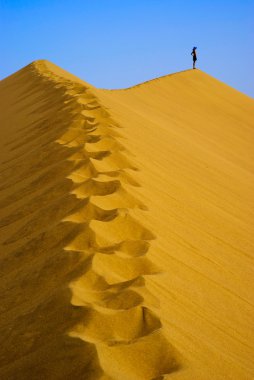 Man on top Sand Dune clipart