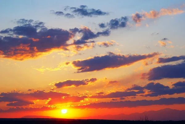 Západ slunce v oblacích — Stock fotografie