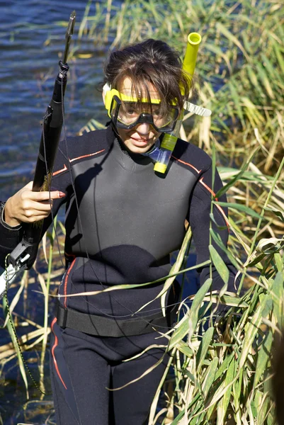 stock image Underwater diving girl on lake