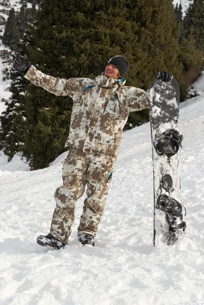 Snowboardåkare skidbacke — Stockfoto