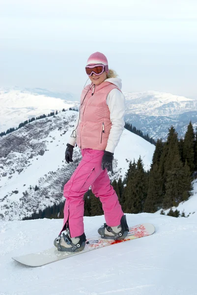 Snowboard ragazza in panno rosa prima della discesa arguzia — Foto Stock