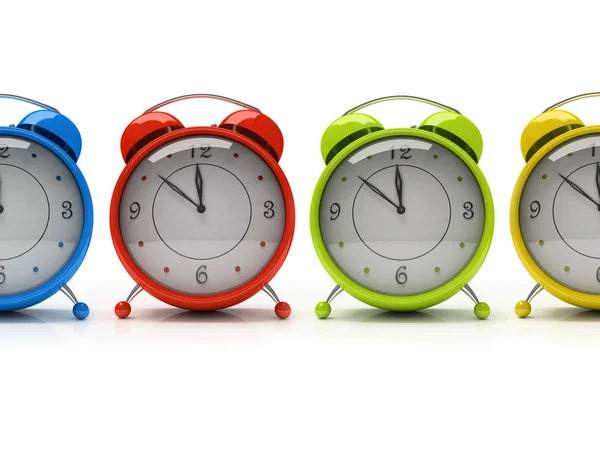 Cuatro coloridos relojes de alarma —  Fotos de Stock