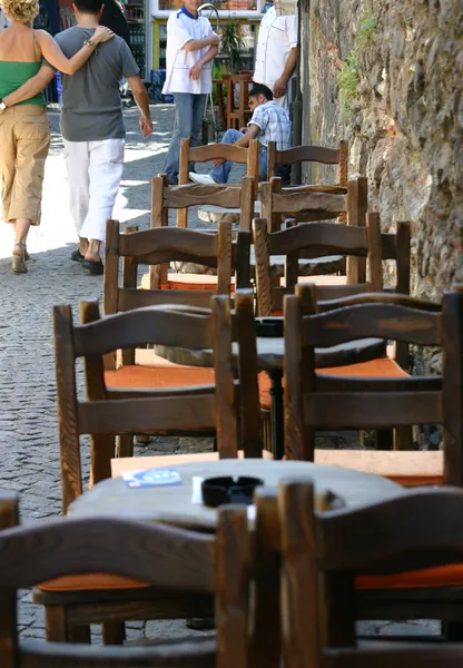 stock image Couple walking in downtown bars street