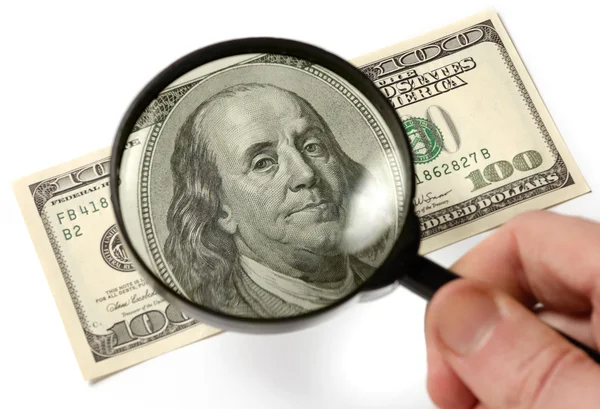 Inspectie van een honderd Dollar Bill — Stockfoto