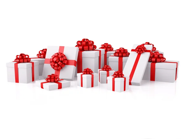Gruppo di scatole regalo bianche con fiocchi rossi — Foto Stock