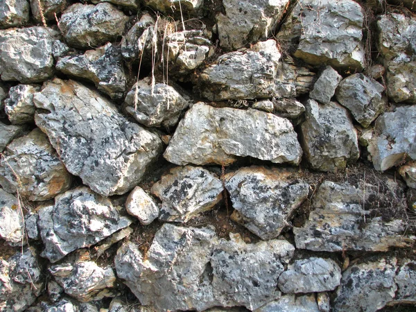Muur gebouwd door stone — Stockfoto