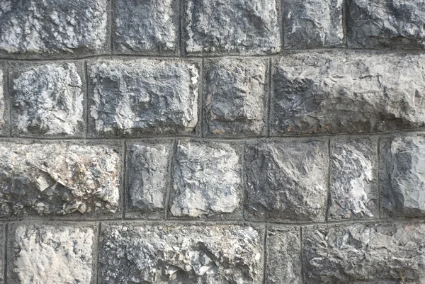 Muur door stenen — Stockfoto