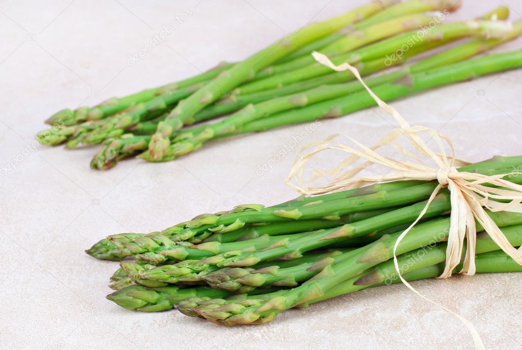 Two bunches of fresh asparagus