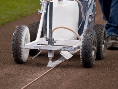 Preparing the Field with the Line Marker clipart