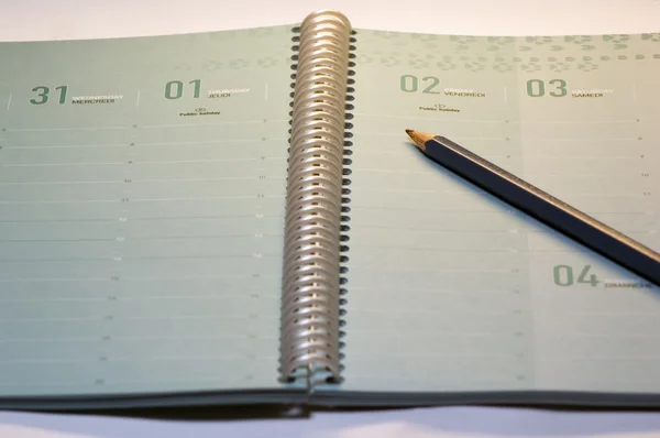 Cuaderno y lápiz —  Fotos de Stock