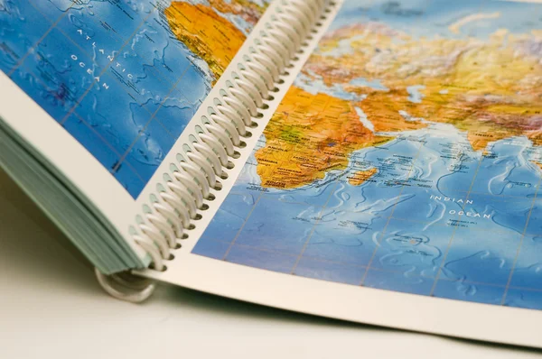 Opened book with map on it — Stock Photo, Image