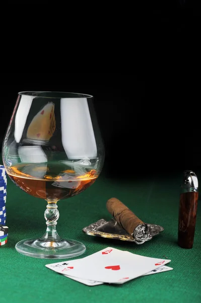 stock image Cigar and drink on green