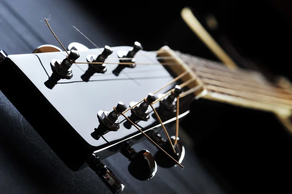 Neck of black guitar — Stock Photo, Image