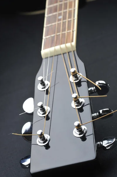 Nek van zwarte gitaar — Stockfoto