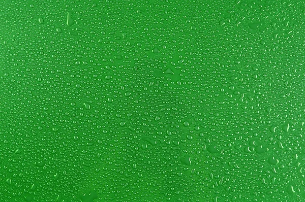 Krople wody na zielono — Zdjęcie stockowe