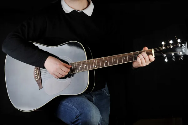 stock image Man playing on guitar